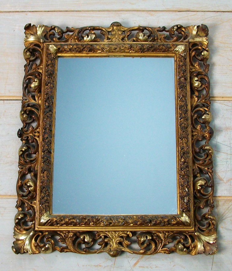 Florentine gilt carved and foliate scroll frame