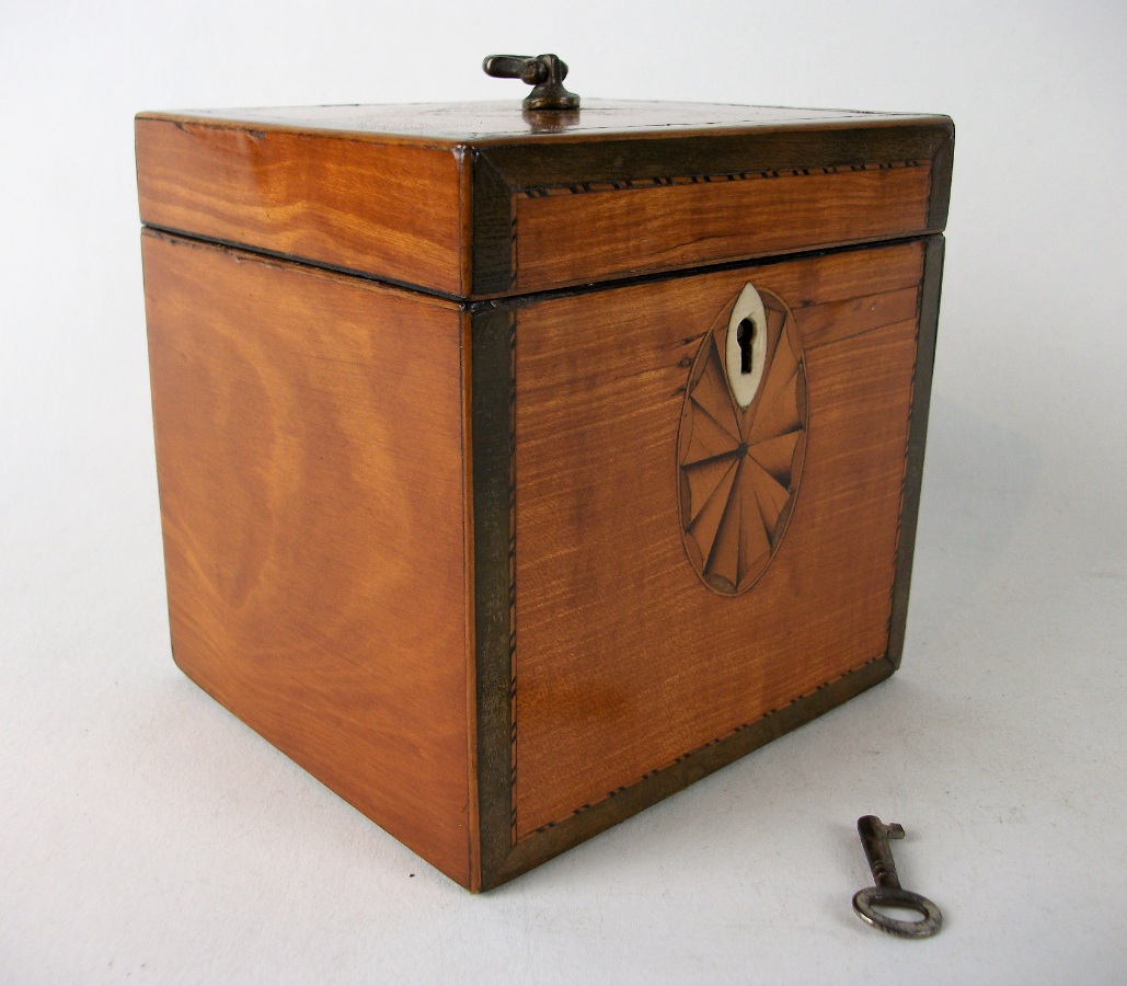 	A fine Georgian period satinwood tea caddy